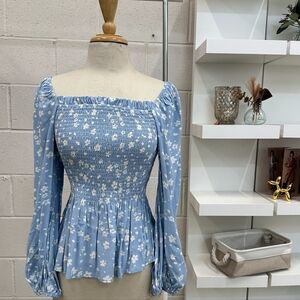 Smocked floral milkmaid top